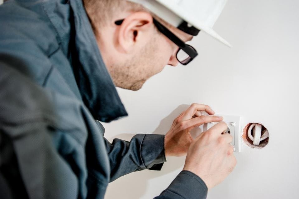 Illustrative photo: fitting a wall switch