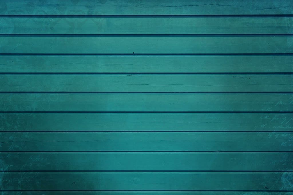 Horizontal timber wall panelling painted deep teal